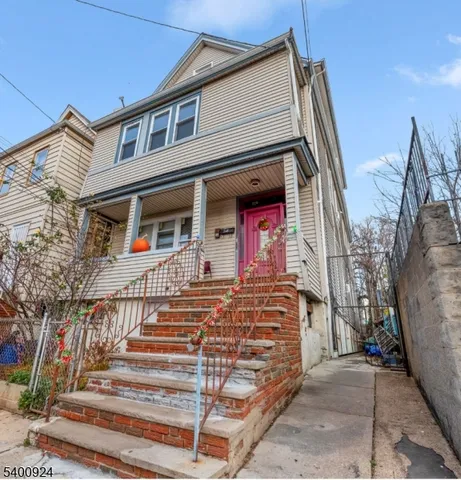 a front view of a house with a garage