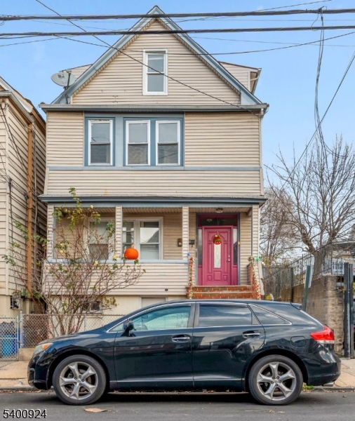 509 Marshall Street, Unit 2 Elizabeth Port, NJ 07206 - Photo 2 of 21 a front view of a house with parking space
