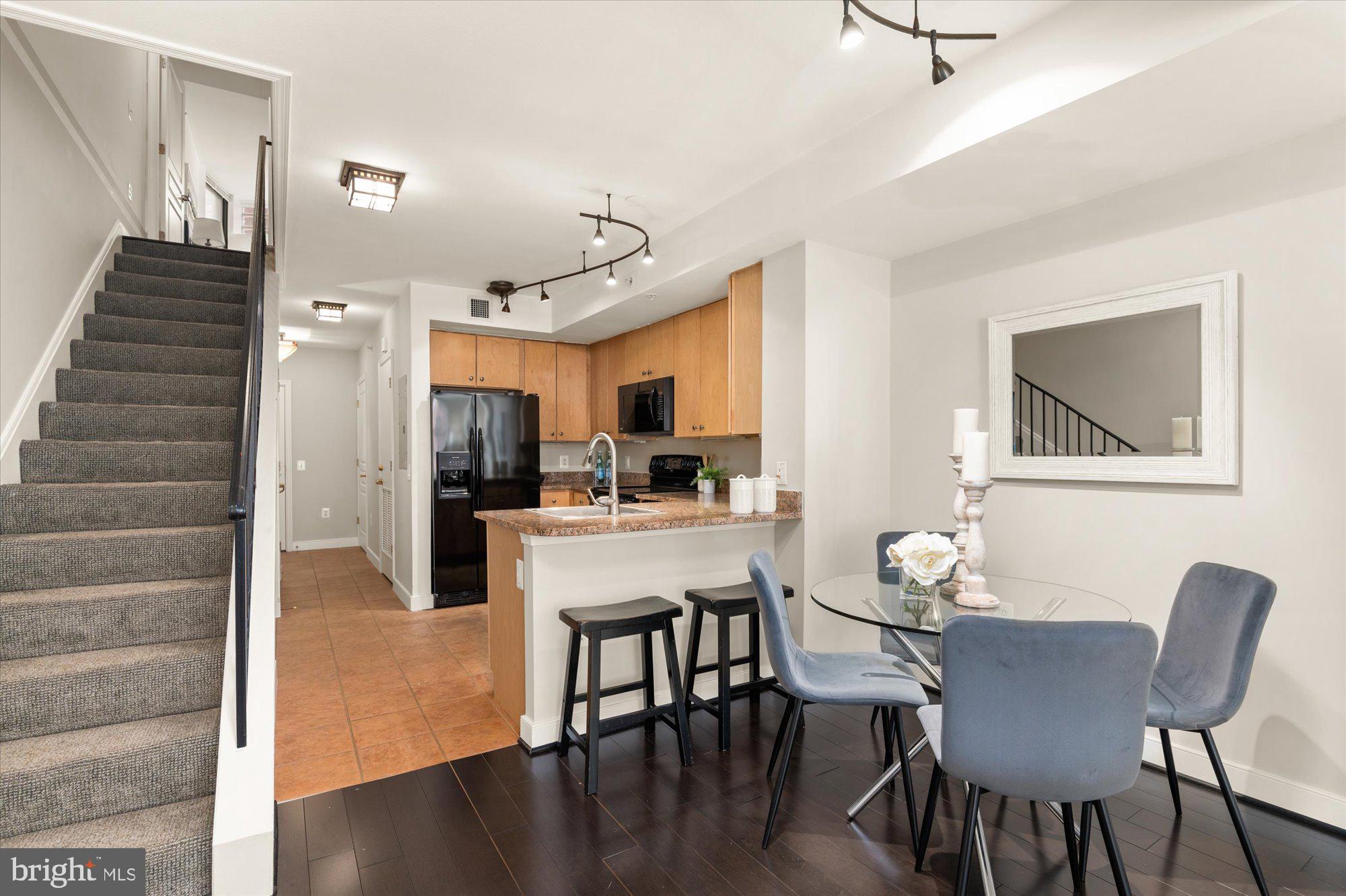 616 E Street Northwest, Unit 854 Washington, DC 20004 - Photo 15 of 87 Open Plan Streams Light through Kitchen