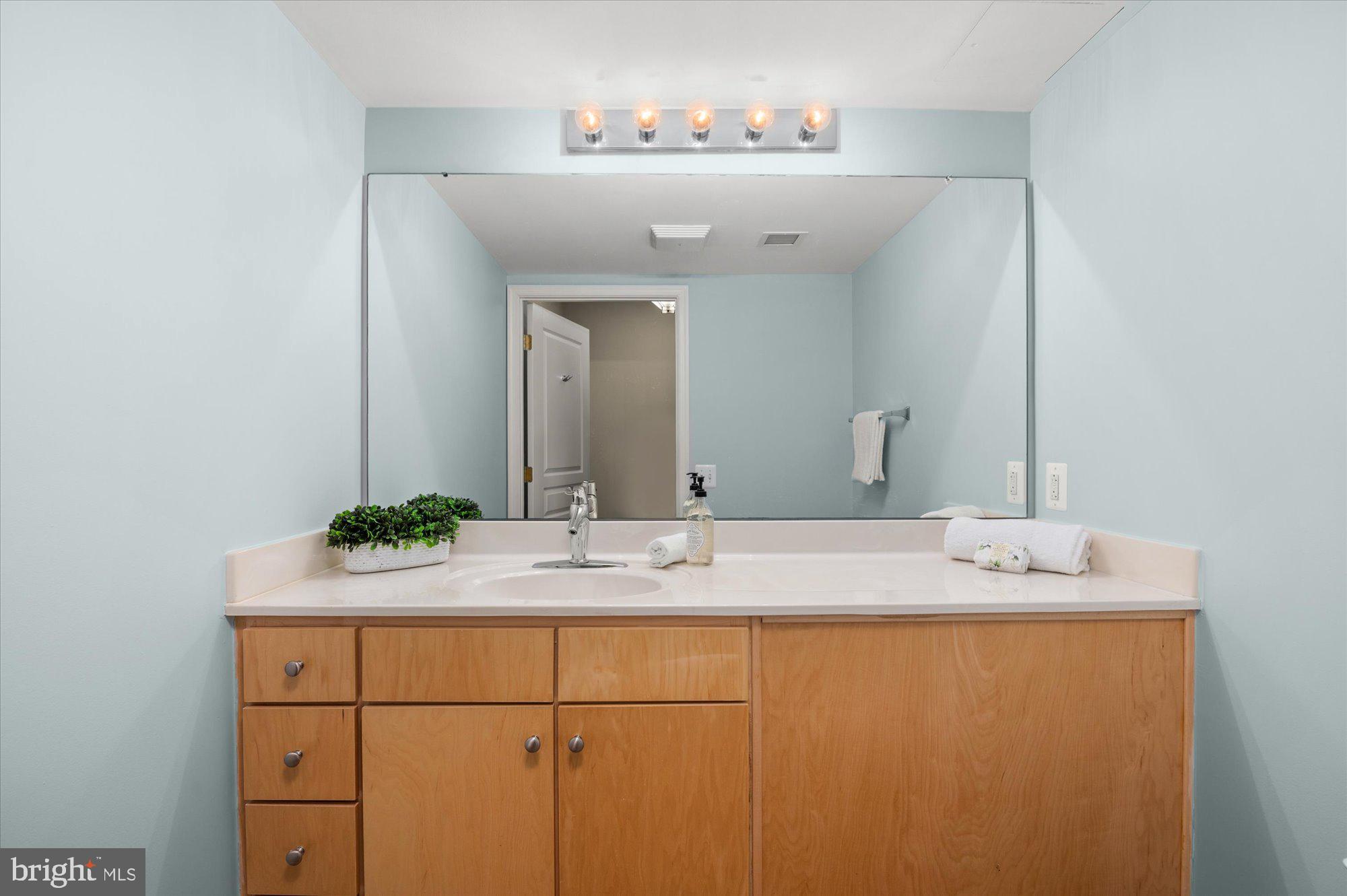 616 E Street Northwest, Unit 854 Washington, DC 20004 - Photo 16 of 87 1st Floor Half Bath with Lots of Light & Storage