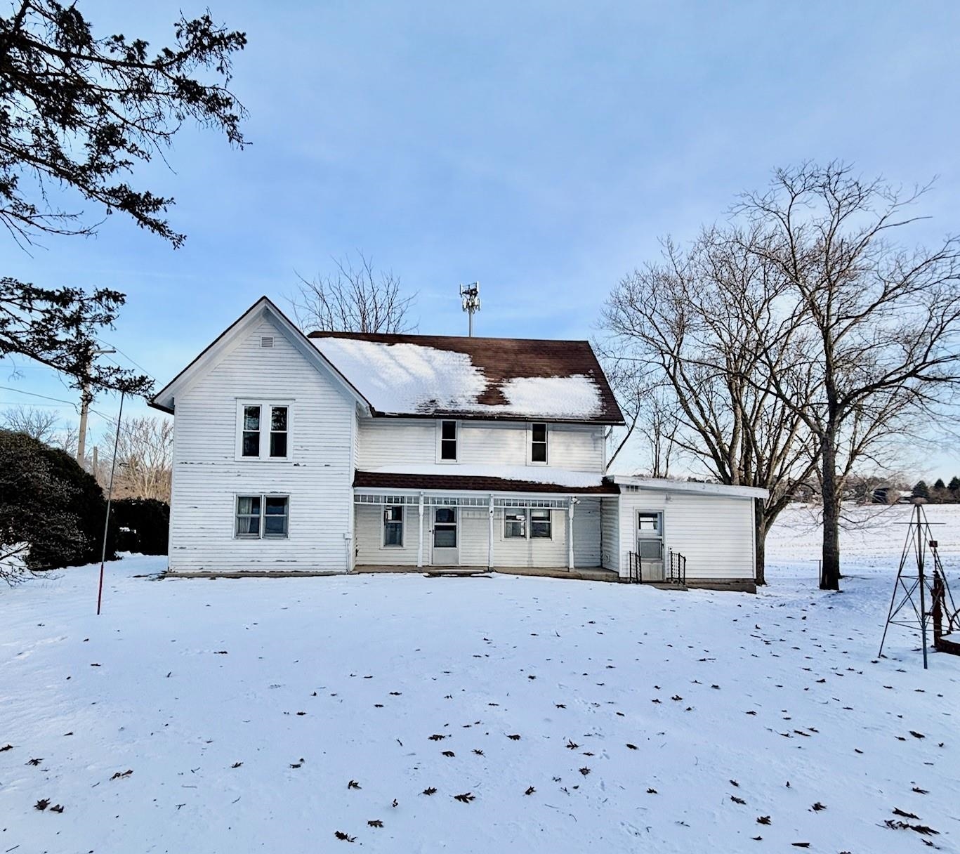 9729 Beaver Valley Road Belvidere, IL 61008 - Photo 11 of 55 a front view of a house with a yard