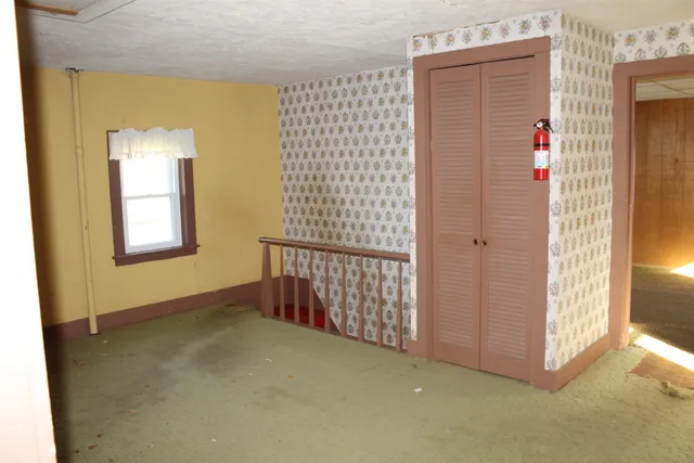 a view of a livingroom with an entryway