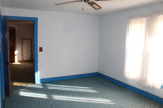 an empty room with window