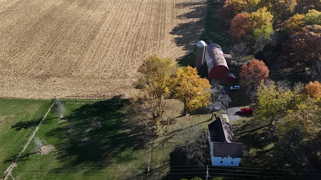 a backyard of a house with lots of green space