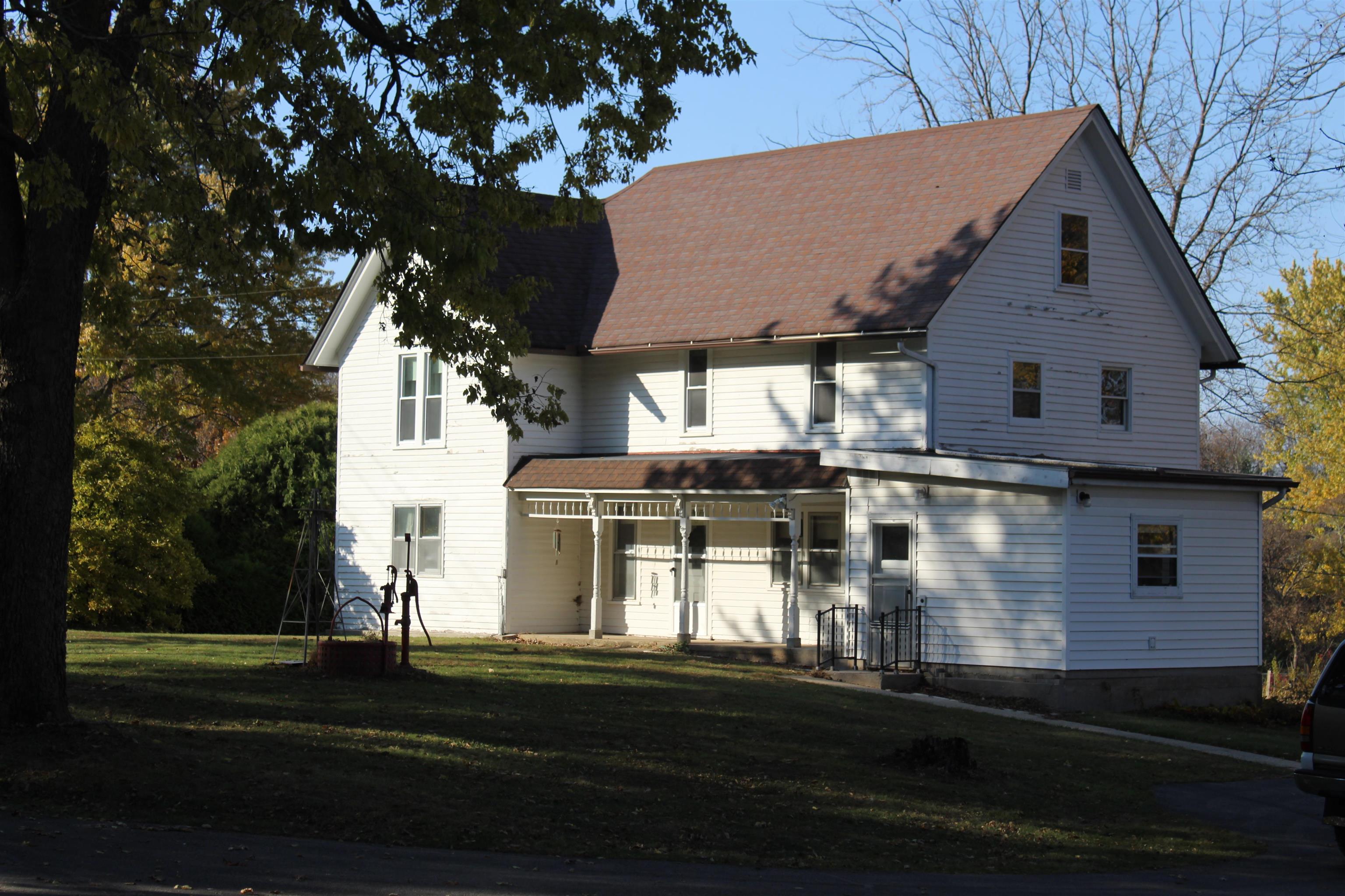 9729 Beaver Valley Road Belvidere, IL 61008 - Photo 10 of 55 a front view of a house with a yard