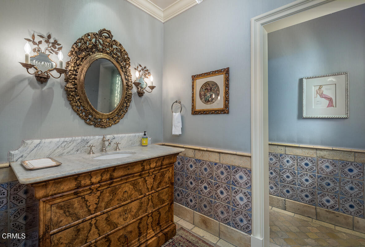 100 Los Altos Drive Pasadena, CA 91105 - Photo 25 of 72 a bathroom with a sink and a mirror