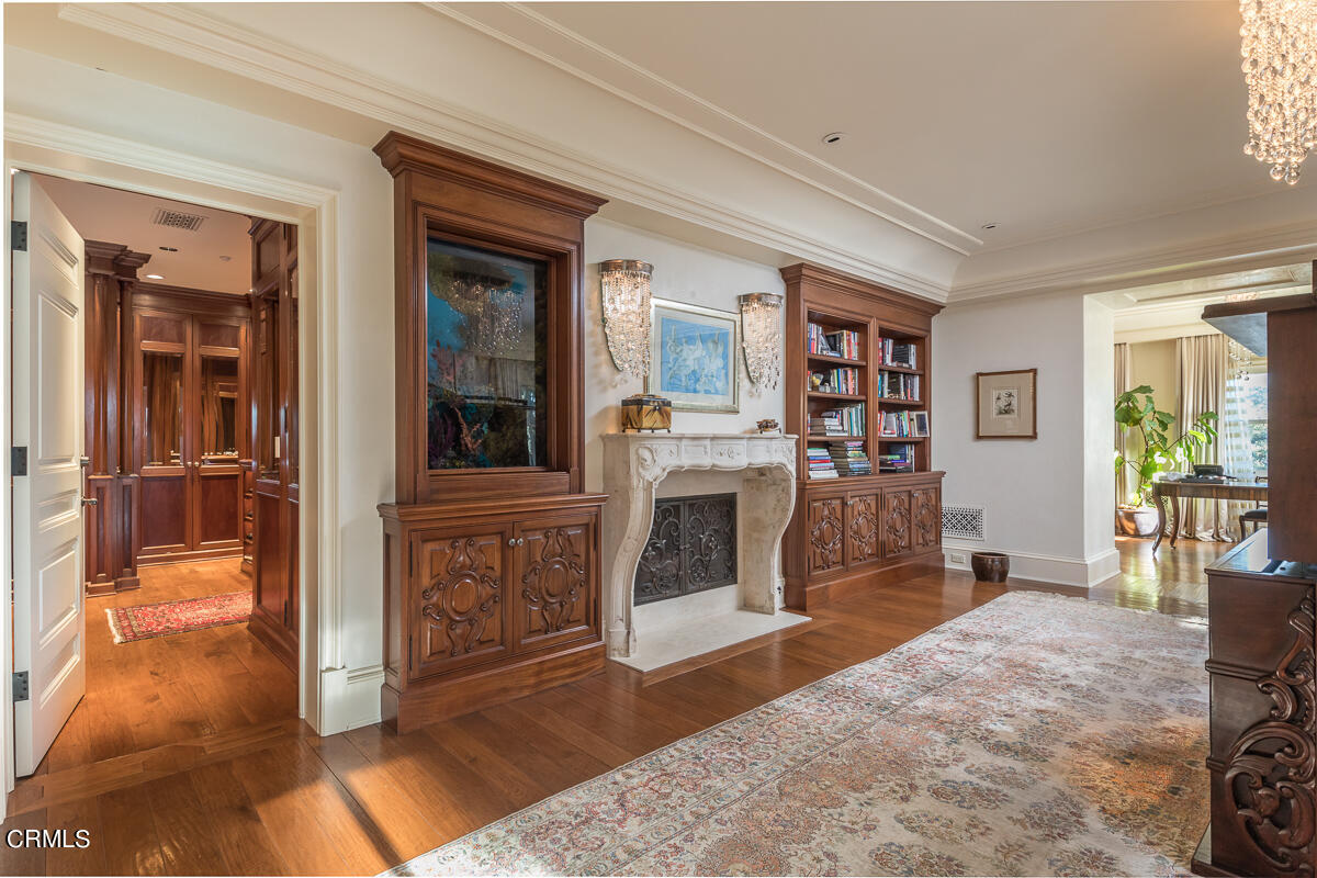 100 Los Altos Drive Pasadena, CA 91105 - Photo 35 of 72 a living room with furniture a fireplace and a large window