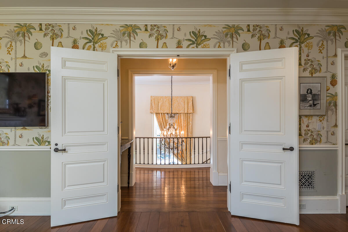 100 Los Altos Drive Pasadena, CA 91105 - Photo 42 of 72 a view of walk in closet with cabinet and wooden floor