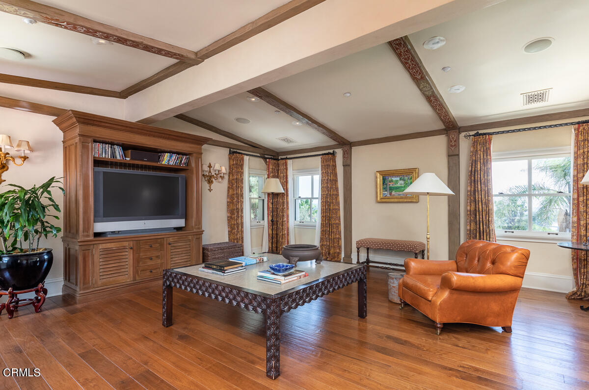 100 Los Altos Drive Pasadena, CA 91105 - Photo 50 of 72 a living room with furniture and a flat screen tv