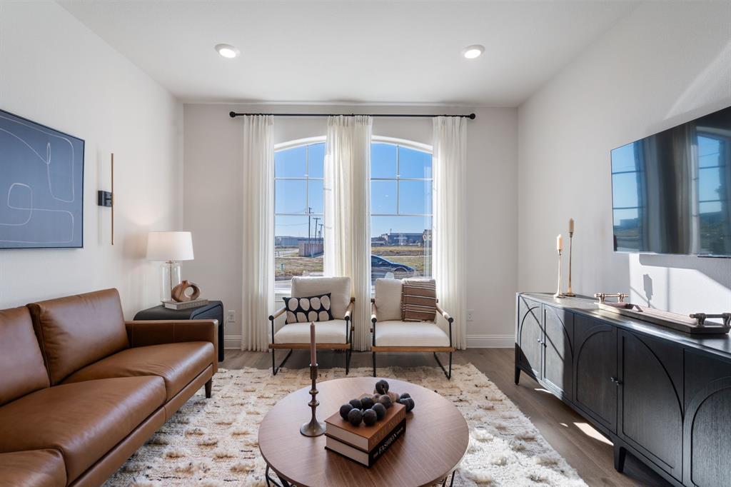 1008 Snapdragon Drive Euless, TX 76039 - Photo 3 of 12 a living room with furniture rug and window