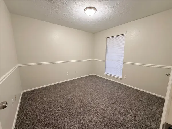 an empty room with an empty space