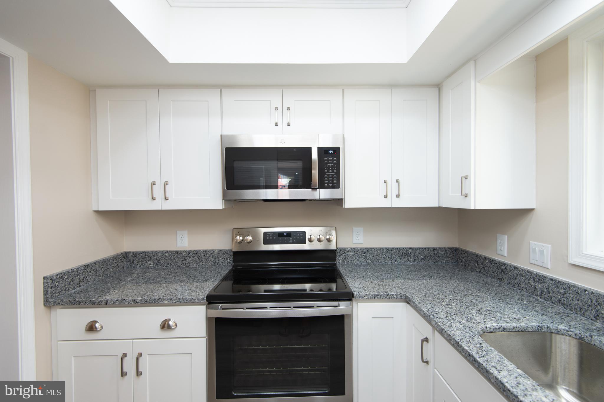 214 Market Square, Unit 7A Cambridge, MD 21613 - Photo 9 of 54 Kitchen with granite countertops