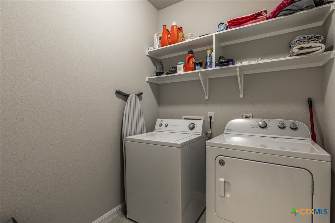 6142 Fairburn Temple, TX 76502 - Photo 30 of 38 a utility room with dryer and washer