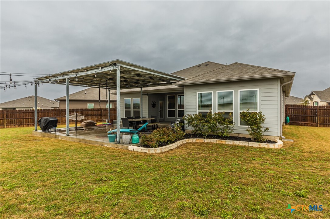 6142 Fairburn Temple, TX 76502 - Photo 37 of 38 a view of a house with swimming pool and porch with furniture