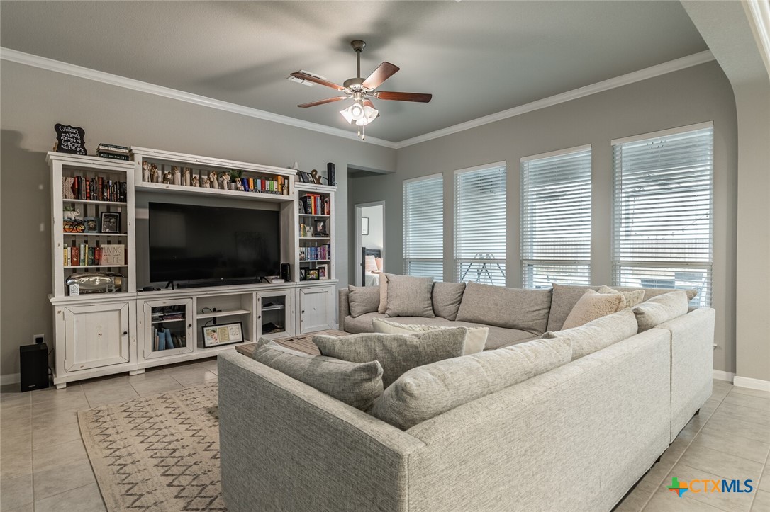 6142 Fairburn Temple, TX 76502 - Photo 10 of 38 a living room with furniture and a flat screen tv