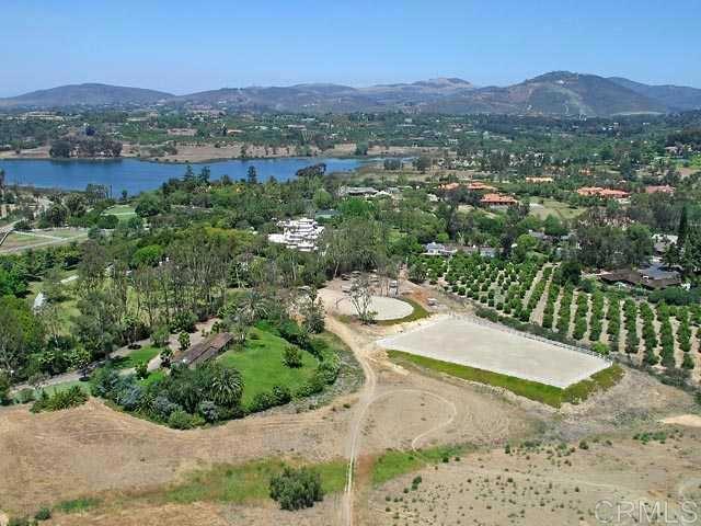 6710 El Montevideo Rancho Santa Fe, CA 92067 - Photo 2 of 20 an aerial view of a house with a yard