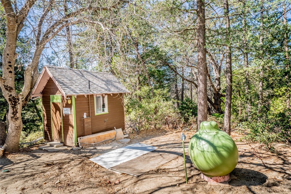 52647 Pine Cove Road Idyllwild, CA 92549 - Photo 25 of 35 a view of a house with a tree