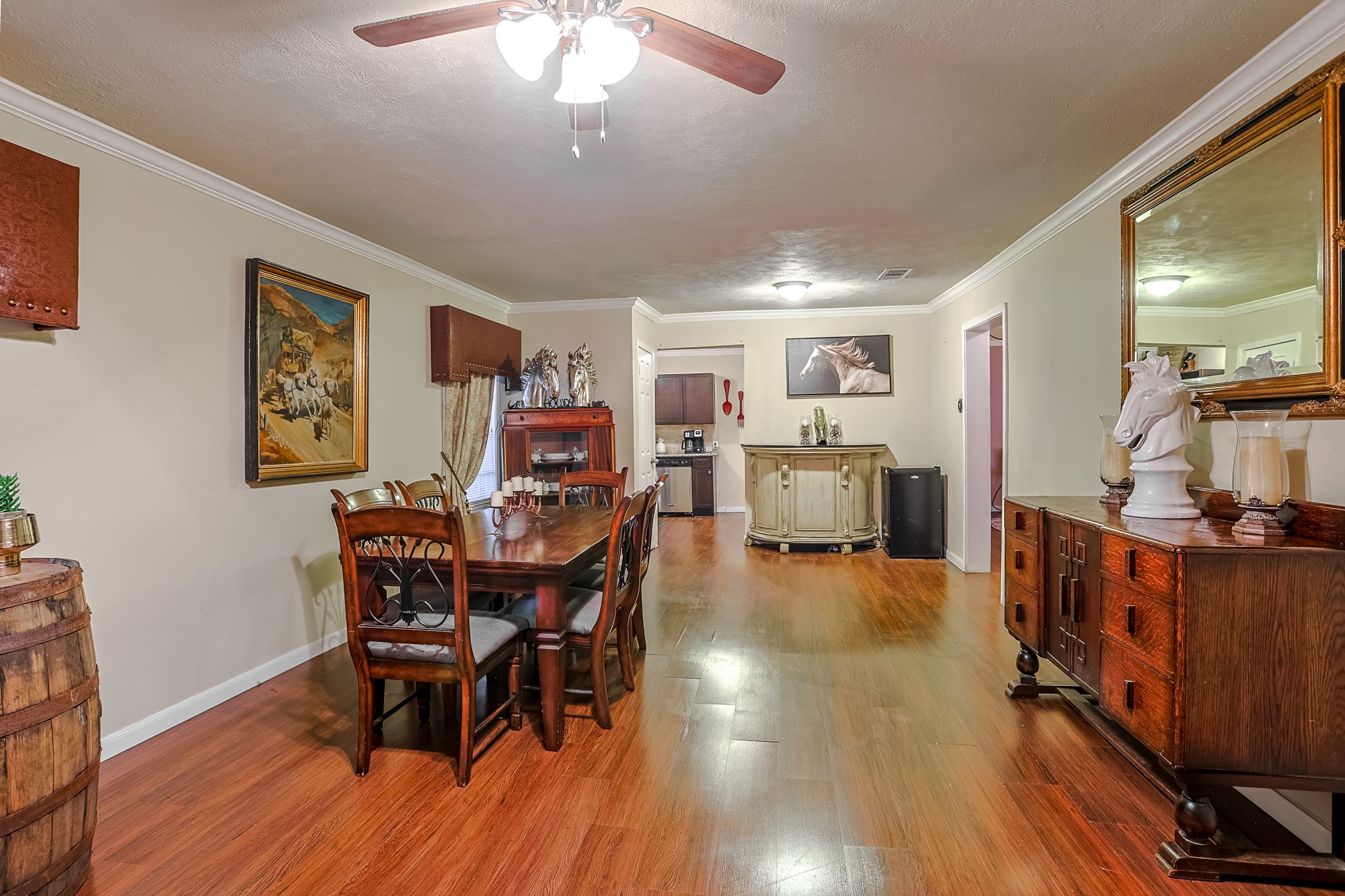 776 Fair Street Houston, TX 77088 - Photo 4 of 14 a view of a dining room with furniture and wooden floor