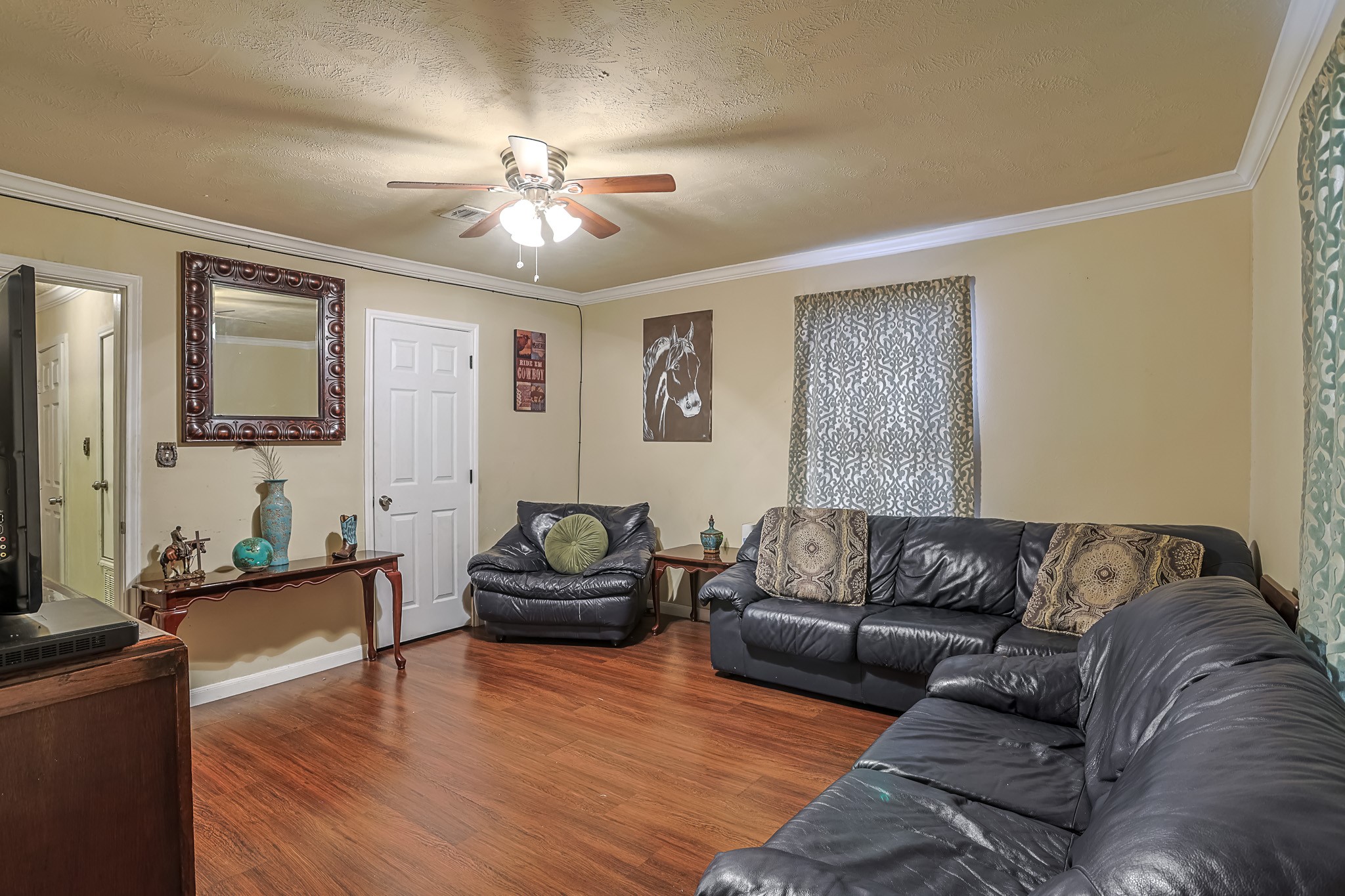 776 Fair Street Houston, TX 77088 - Photo 8 of 14 a living room with furniture and a large window