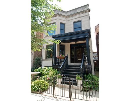 a view of a house with entryway and plants
