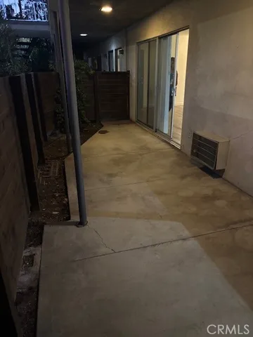 a living room with hard wood floors