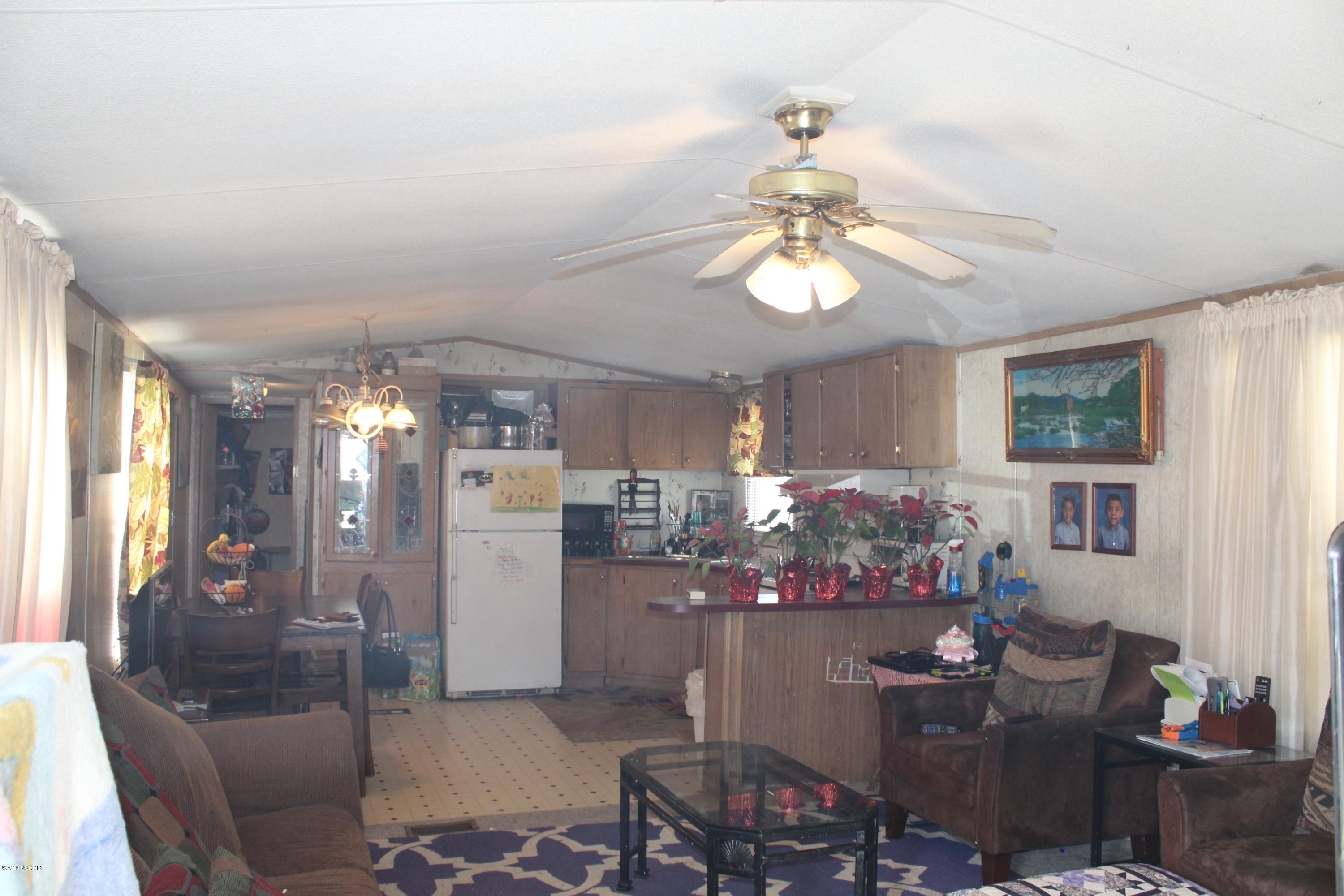 1806 Seaside Road Southwest Sunset Beach, NC 28468 - Photo 3 of 10 Open Living Area