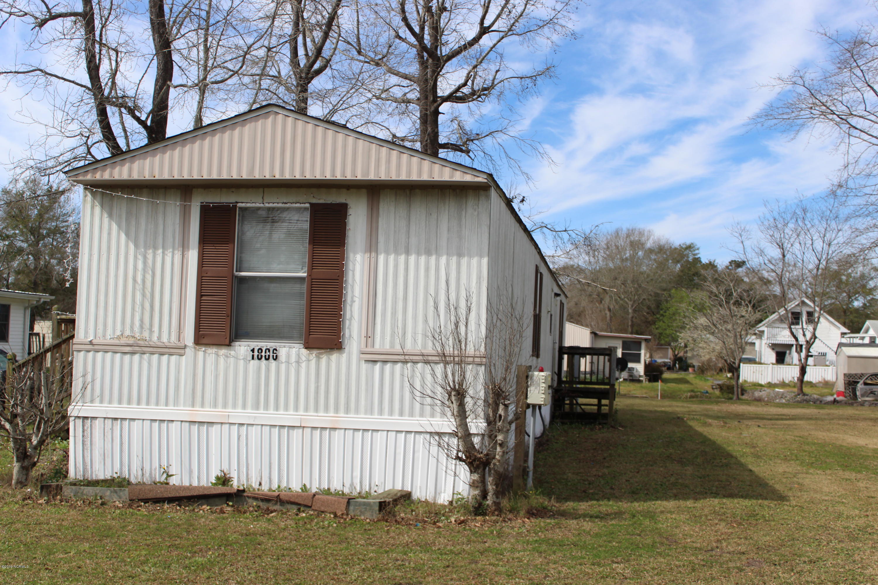 1806 Seaside Road Southwest Sunset Beach, NC 28468 - Photo 4 of 10 Rear of home