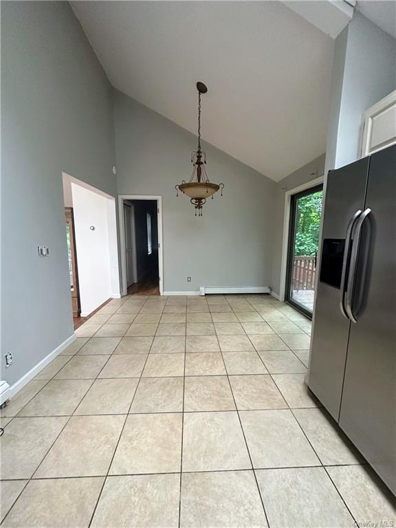 357 South Plank Road Newburgh, NY 12550 - Photo 9 of 16 a view of a livingroom with a chandelier