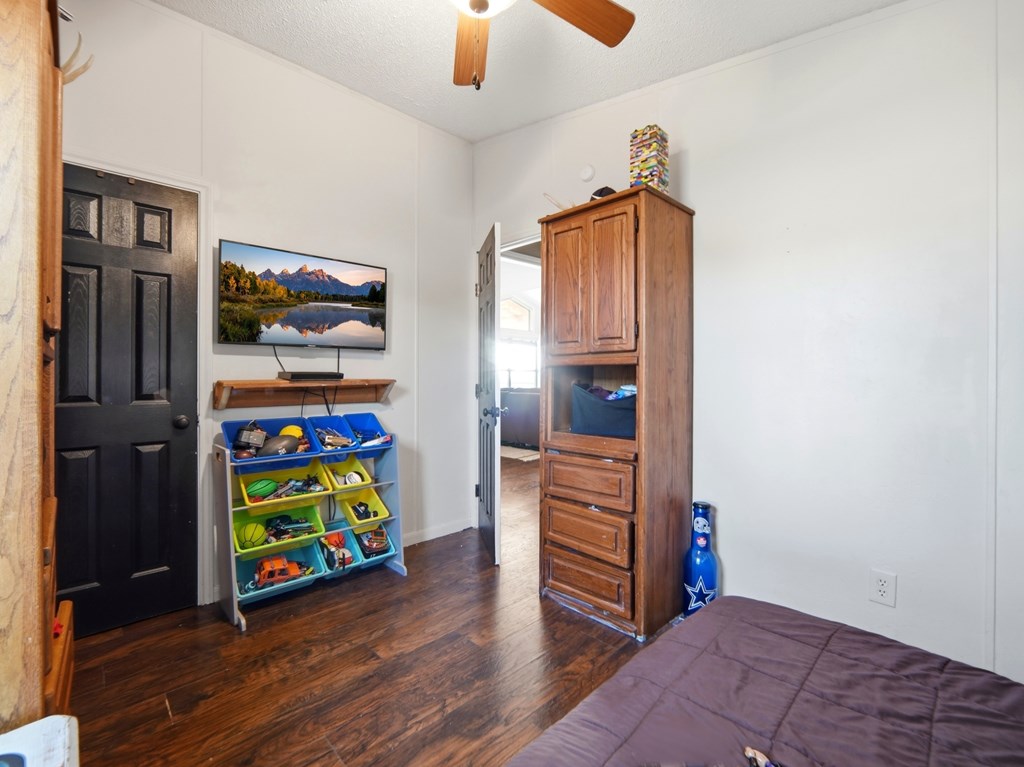 127 Windmill Drive Bandera, TX 78003 - Photo 19 of 29 a view of an entryway with wooden floor