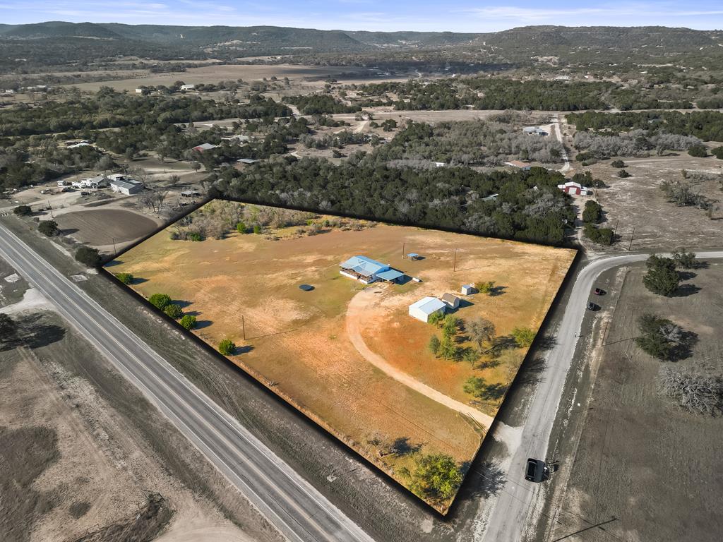 127 Windmill Drive Bandera, TX 78003 - Photo 3 of 29 an aerial view of residential houses with outdoor space