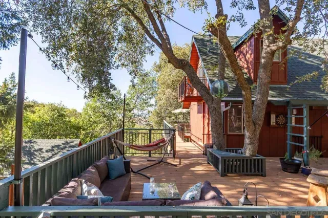 a view of a balcony with chairs