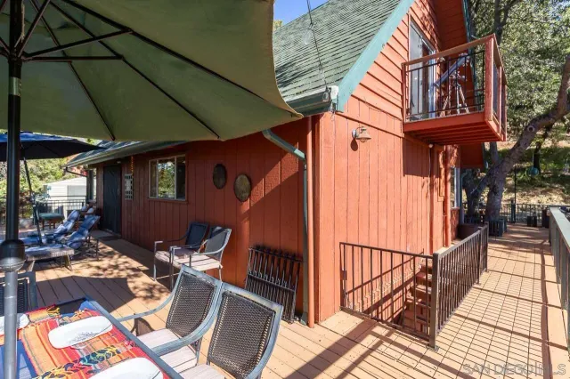 swimming pool view with a seating space