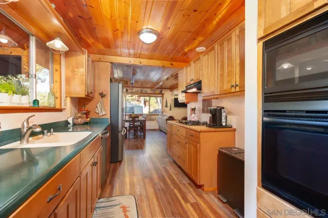 a view of a livingroom with furniture and window