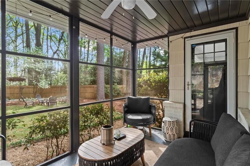 2333 Ferndale Drive Decatur, GA 30030 - Photo 25 of 30 a living room with furniture and a floor to ceiling window