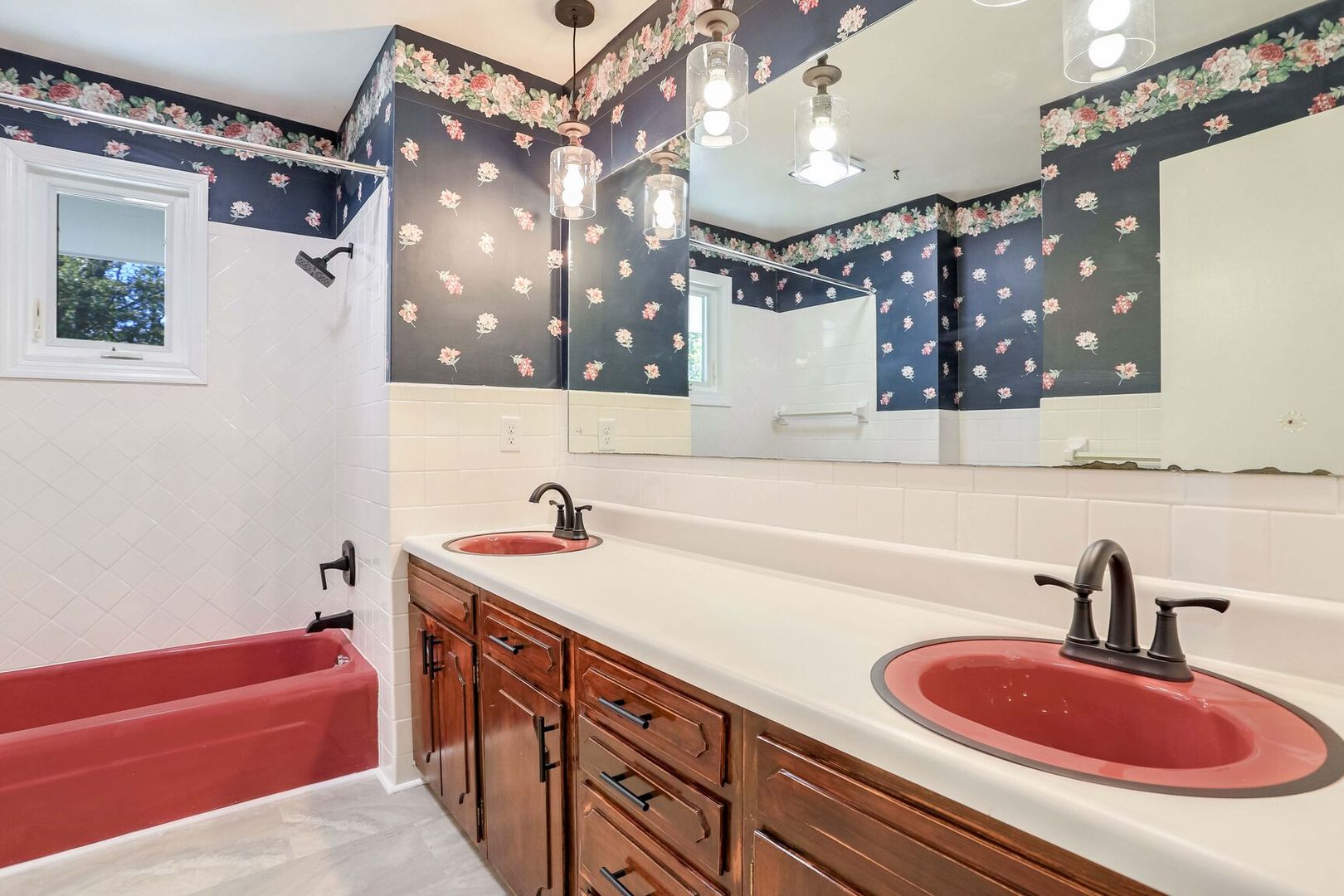 1716 Georgetown Drive Champaign, IL 61821 - Photo 25 of 36 a bathroom with a sink a tub and a mirror