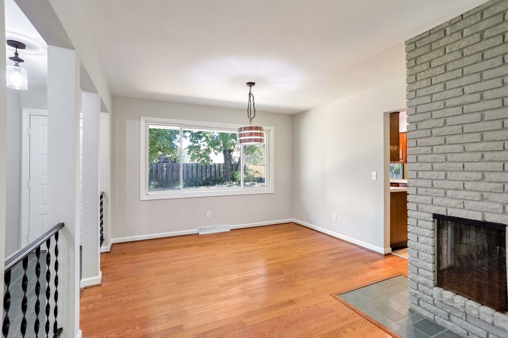 1716 Georgetown Drive Champaign, IL 61821 - Photo 10 of 36 a big room with windows and a fireplace