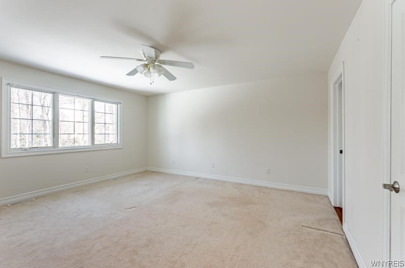 5061 Rockhaven Drive Clarence, NY 14031 - Photo 21 of 48 Primary suite overlooks back yard