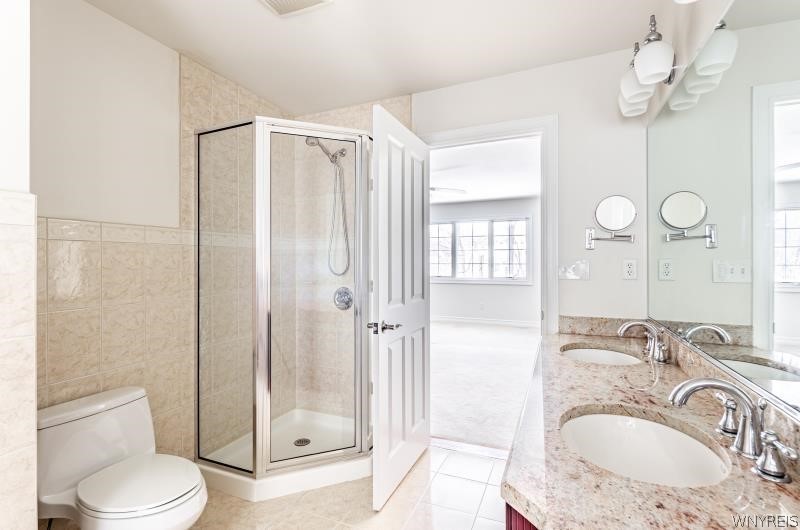 5061 Rockhaven Drive Clarence, NY 14031 - Photo 23 of 48 En suite bathroom with shower