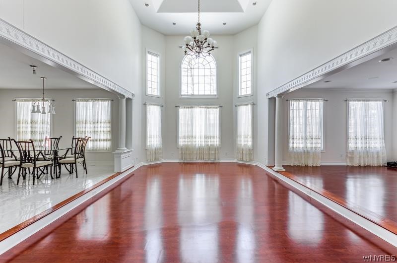 5061 Rockhaven Drive Clarence, NY 14031 - Photo 3 of 48 Two story family room overlooking yard