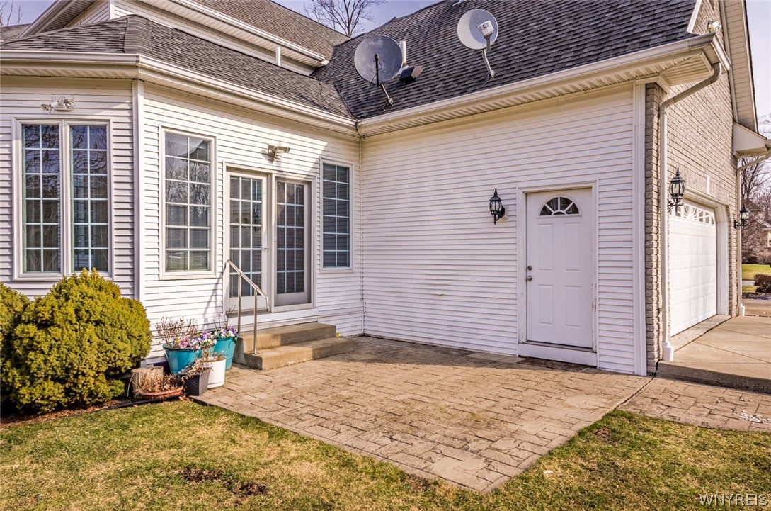 5061 Rockhaven Drive Clarence, NY 14031 - Photo 34 of 48 Patio off the sunroom