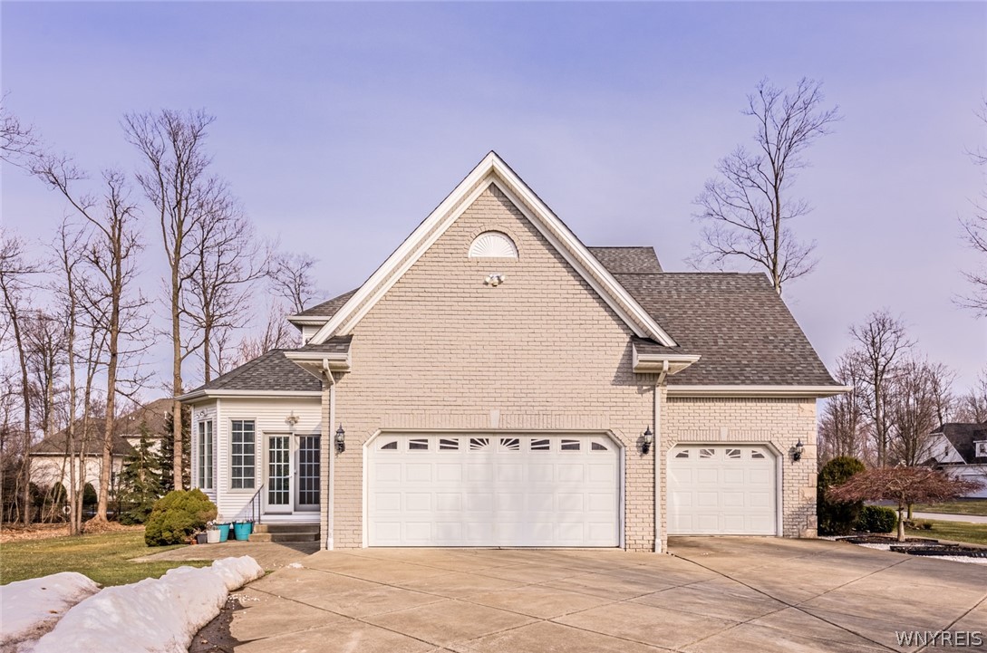 5061 Rockhaven Drive Clarence, NY 14031 - Photo 36 of 48 Oversized cement area and 3 car garage