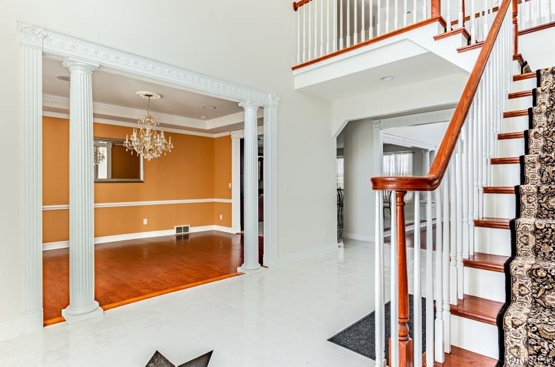 5061 Rockhaven Drive Clarence, NY 14031 - Photo 4 of 48 Two story foyer opens to dining room