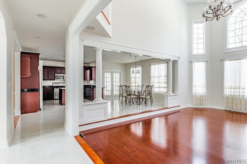 5061 Rockhaven Drive Clarence, NY 14031 - Photo 8 of 48 Foyer view into open kitchen