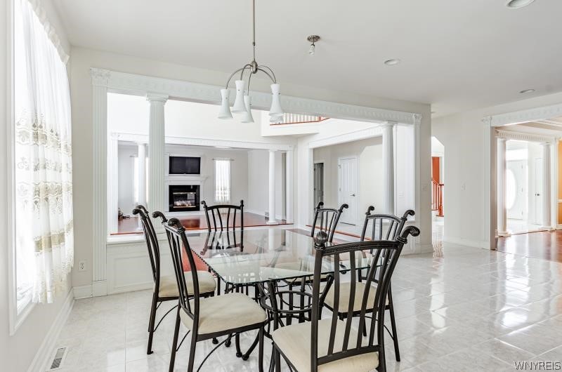 5061 Rockhaven Drive Clarence, NY 14031 - Photo 10 of 48 Eat-in kitchen area overlooking yard