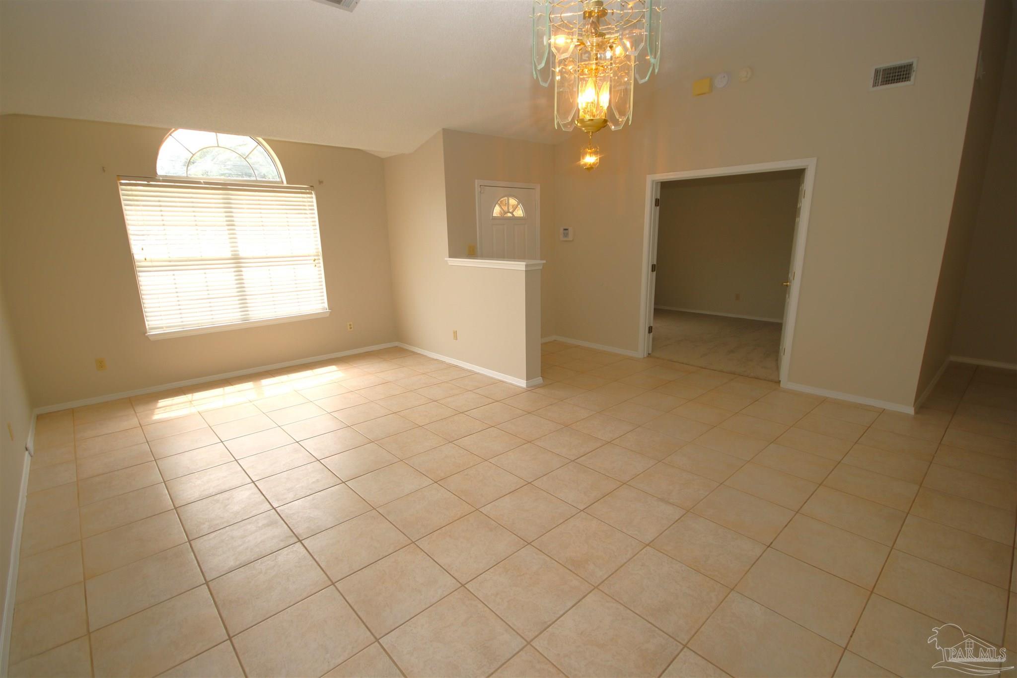 4959 Pattock Place Pace, FL 32571 - Photo 19 of 50 Large opening w/double doors is 4th bedroom/office