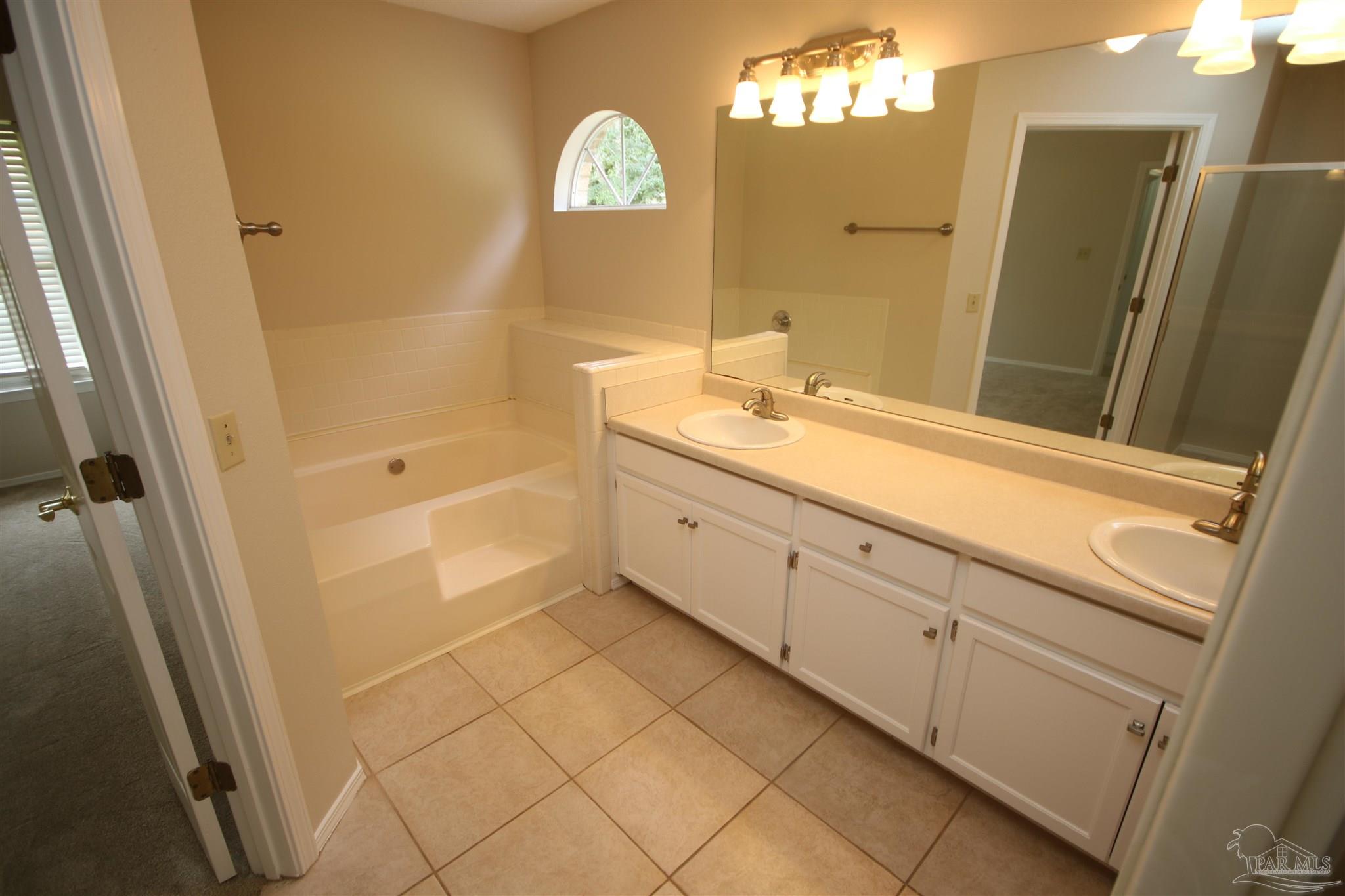 4959 Pattock Place Pace, FL 32571 - Photo 29 of 50 faucets, cabinet pulls & toilet have been updated.