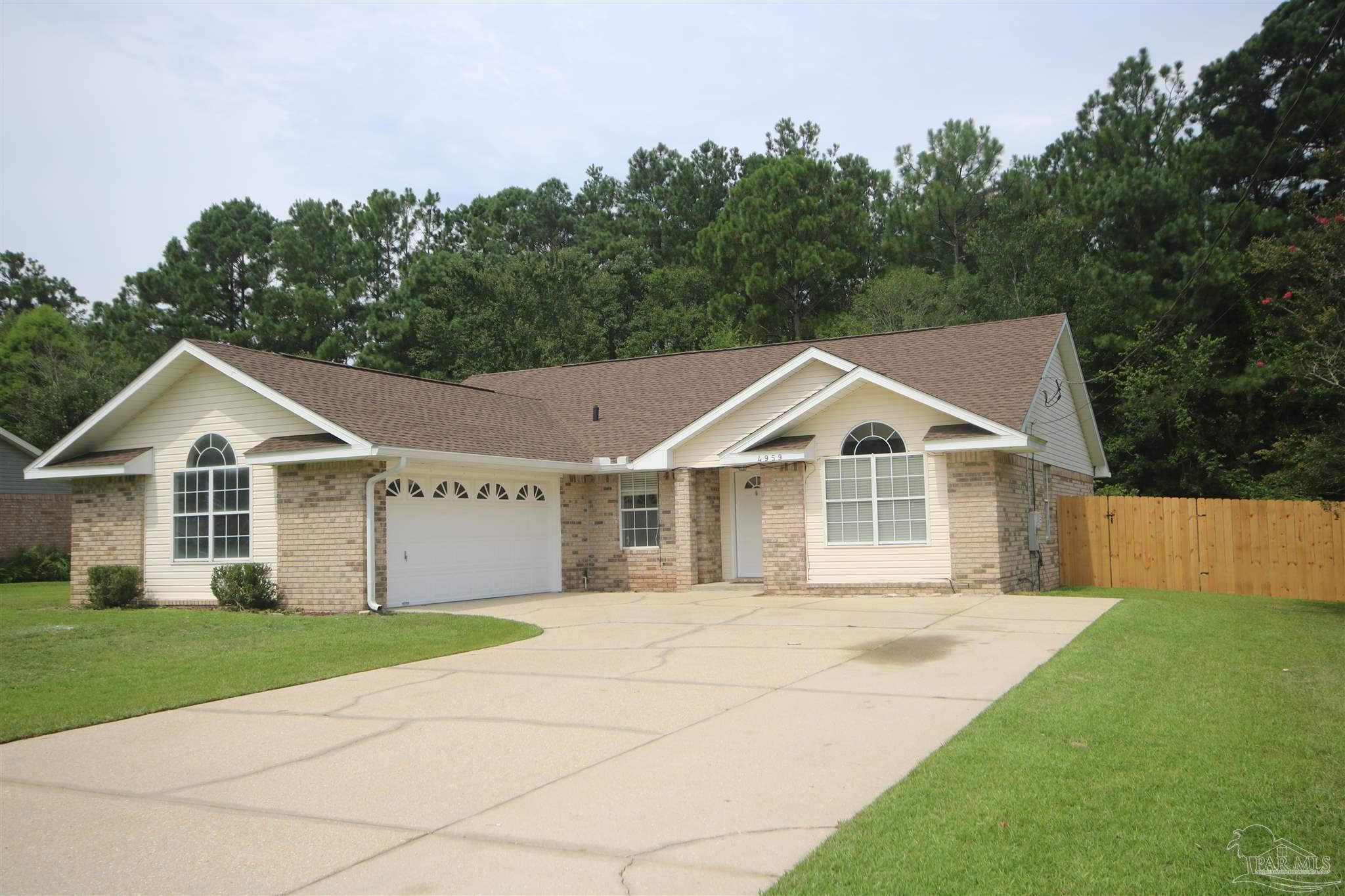 4959 Pattock Place Pace, FL 32571 - Photo 7 of 50 are on each side of the home.Gutters w/ downspouts