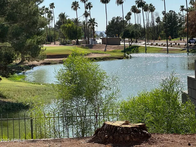 a view of a swimming pool with a patio