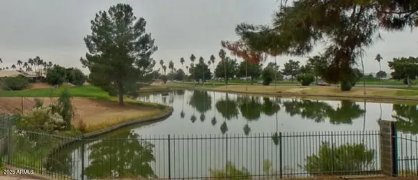 a view of a lake from a balcony
