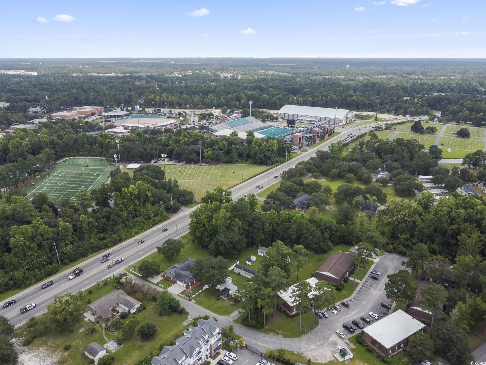 615 Carter Lane, Unit A1 Conway, SC 29526 - Photo 13 of 31 Aerial overview of property's location with a tree filled landscape